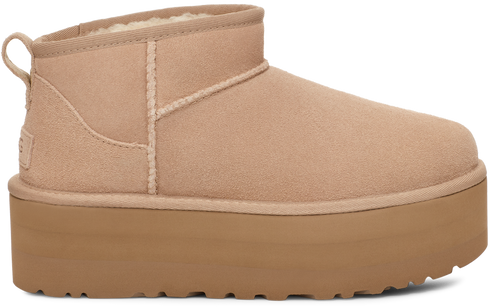 Tan suede platform boot with a pull tab.