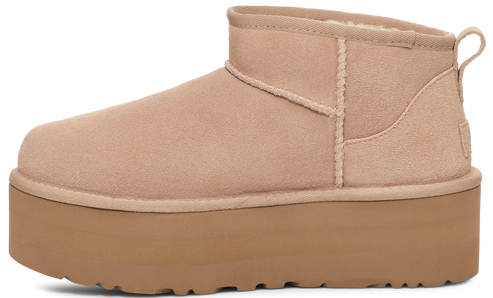 Tan suede platform mini boot with a rounded toe.