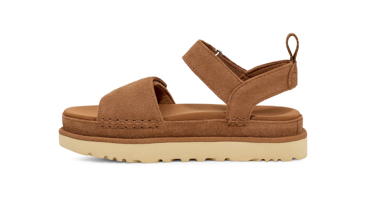 Side view of a brown suede sandal with adjustable ankle strap and a platform sole.