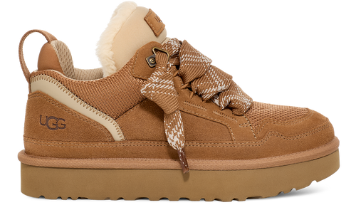 Low-top platform sneaker in brown with plaid laces and shearling trim.