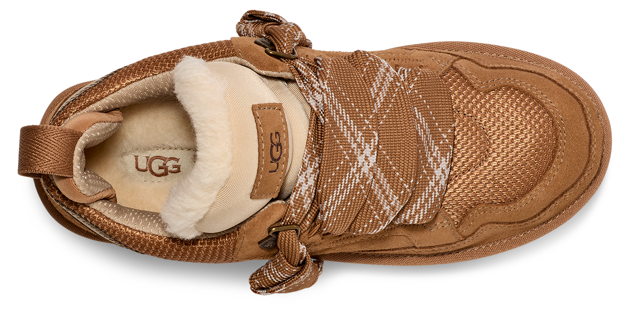 a brown shoe with white fur