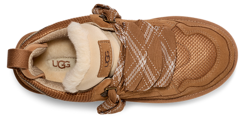 a brown shoe with white fur