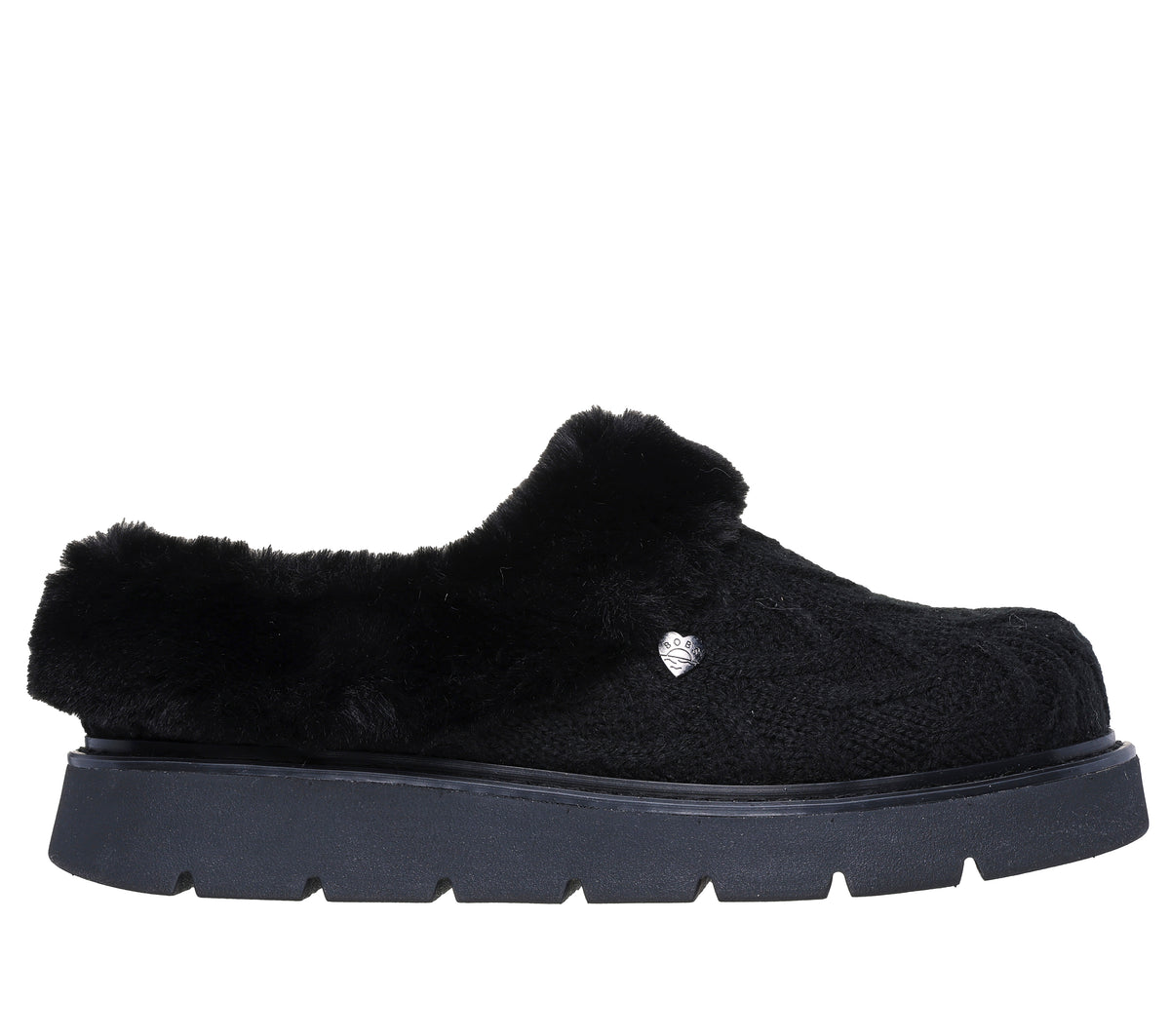 A black slip-on shoe with fuzzy uppers and a black lug sole.