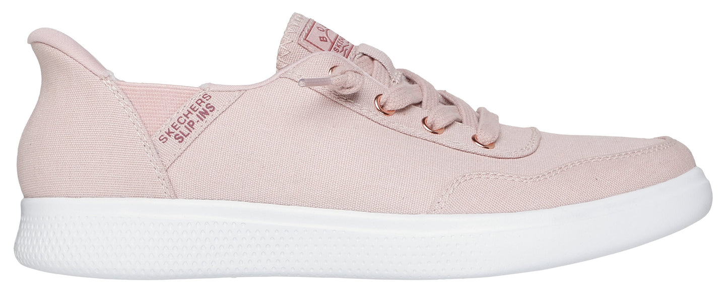 A pink slip-on sneaker with white sole and visible "SKECHERS SLIP-INS" text.