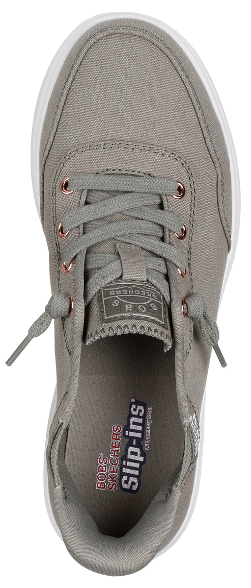 A gray slip-on sneaker with a white sole and laces.