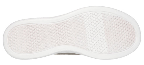 Sole of a shoe with a textured surface surrounded by a smooth border.