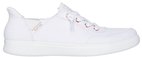 A white sneaker with laces and the word "SKECHERS SLIP-INS" printed on the side.