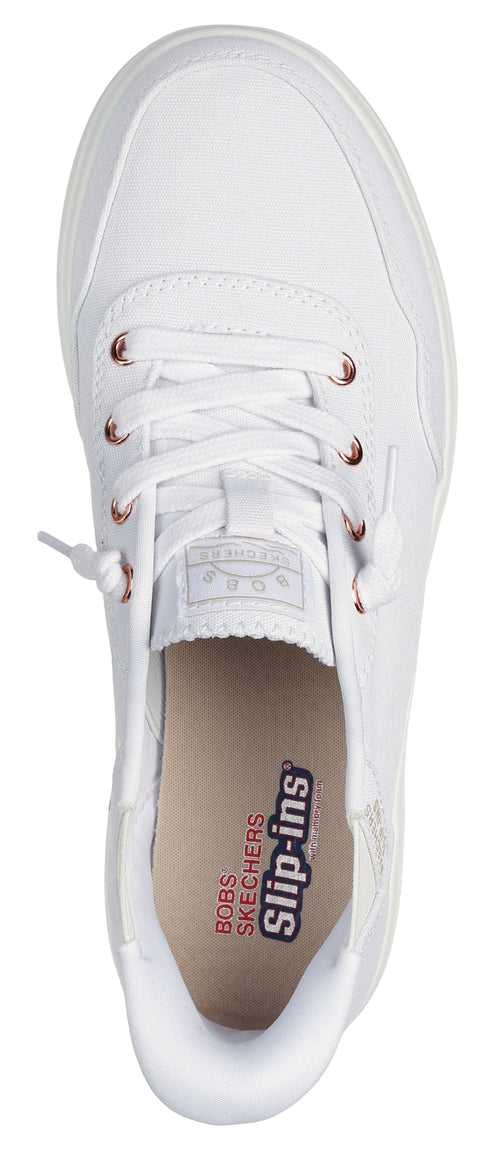 A white slip-on sneaker with eyelets.