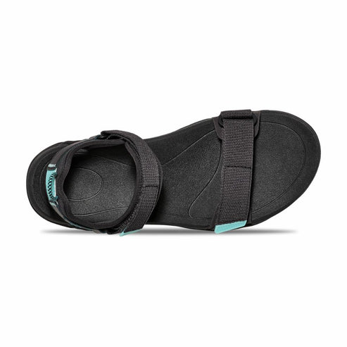 Black sandal with adjustable straps and turquoise accents viewed from above.