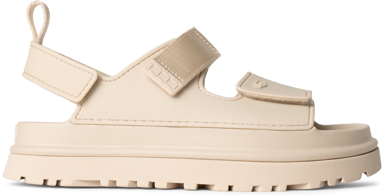 Beige sandal with two hook and loop straps and a chunky sole.