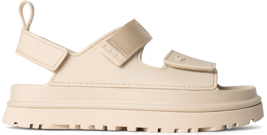 Beige sandal with two hook and loop straps and a chunky sole.