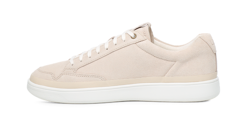 Beige leather sneaker with white laces and white sole.