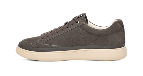 Grey suede sneaker with white sole.