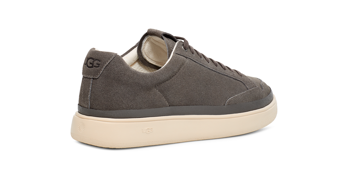 Low-top gray casual sneaker with thick off-white rubber sole and white interior.
