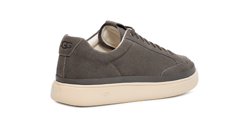 Low-top gray casual sneaker with thick off-white rubber sole and white interior.