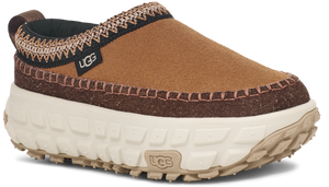 Brown UGG slip-on shoe with thick beige sole and black trim.