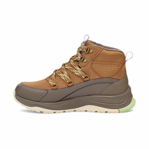 A brown hiking boot with brown laces, light-colored sole, and green accent on the heel.