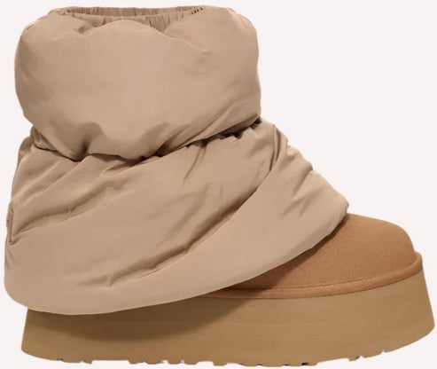 Tan platform boot with a puffy, draped shaft.