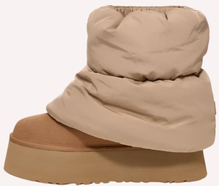 Beige boot with a large, puffy nylon cover.