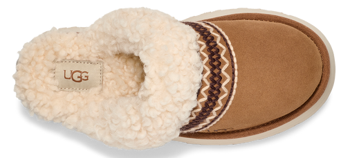 A brown slipper with a white, fuzzy collar and a white logo on the inside.