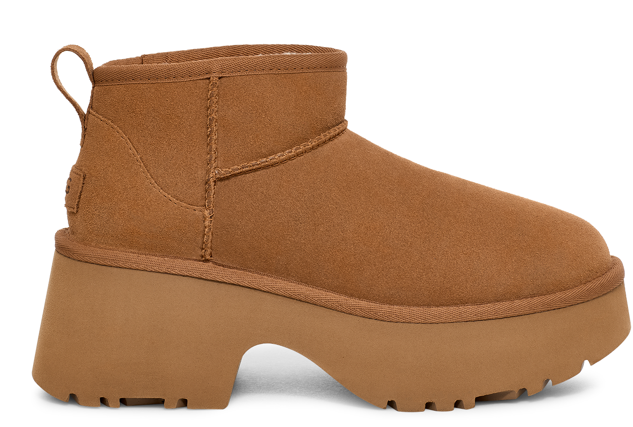 Side view of a brown UGG boot with a thick platform sole.