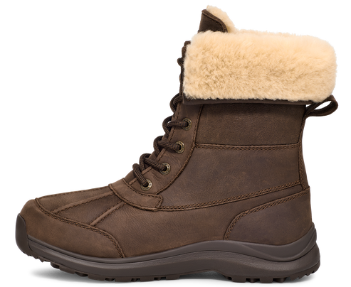 Brown leather boot with lace-up closure and a beige wool cuff.