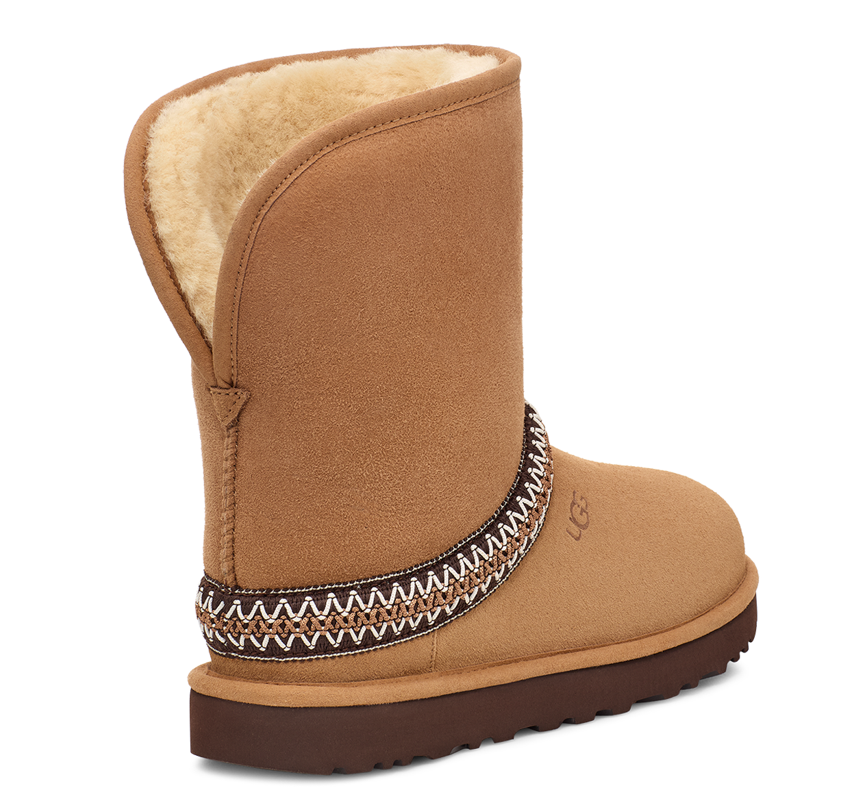 Tan short boot with exposed sheepskin lining and patterned ankle band.