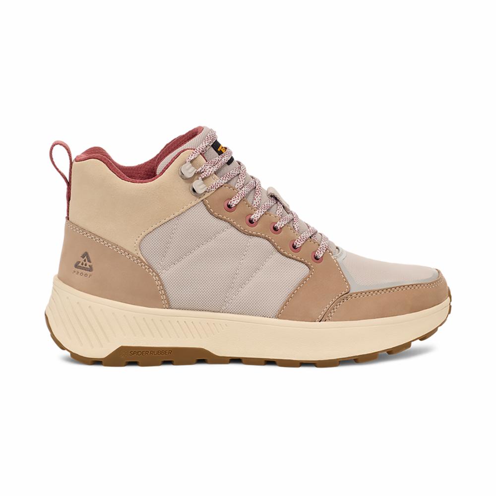 Tan and beige hiking shoe with red lining and laces.