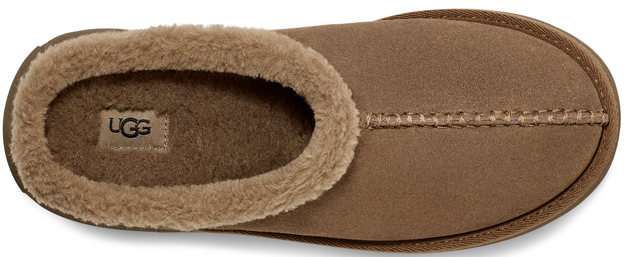 A brown UGG slipper with a plush interior lining.