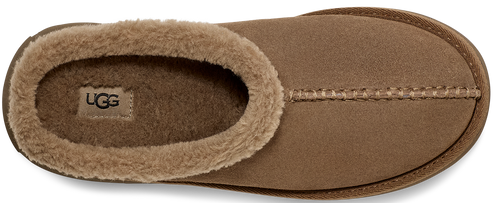 A brown UGG slipper with a plush interior lining.