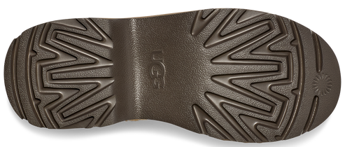 A boot sole with a zigzag pattern and the logo UGG.