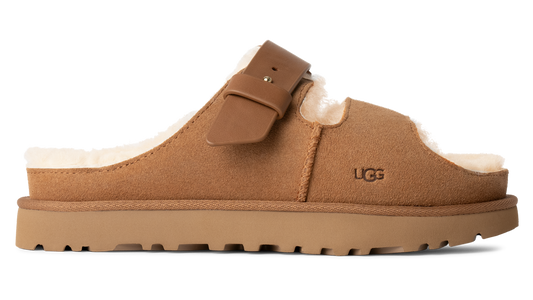 Tan mule slipper with buckle and lug sole.