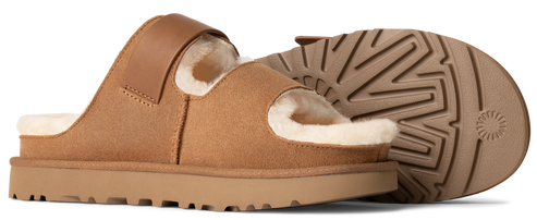 Two tan slide slippers, one showing the sole, with shearling lining.