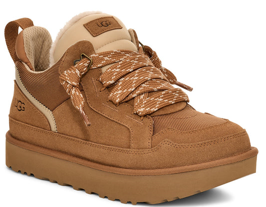 Tan sneaker with patterned laces, light beige collar and loop at back.