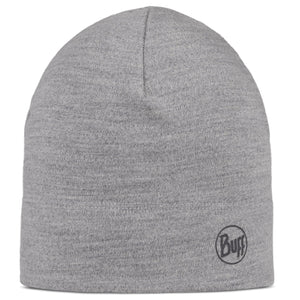 Grey knit beanie with a circular logo near the brim