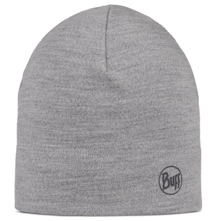 Grey knit beanie with a circular logo near the brim
