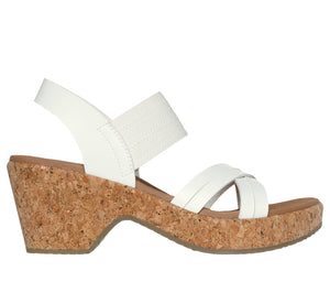White wedge sandal with cork platform and heel.