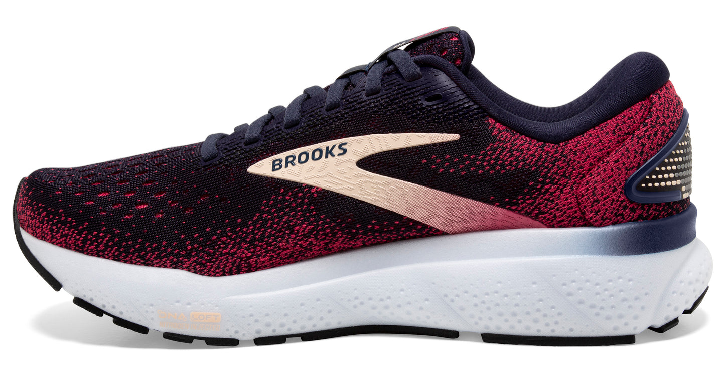 Running shoe, black and burgundy speckled upper, white sole, tan side logo.