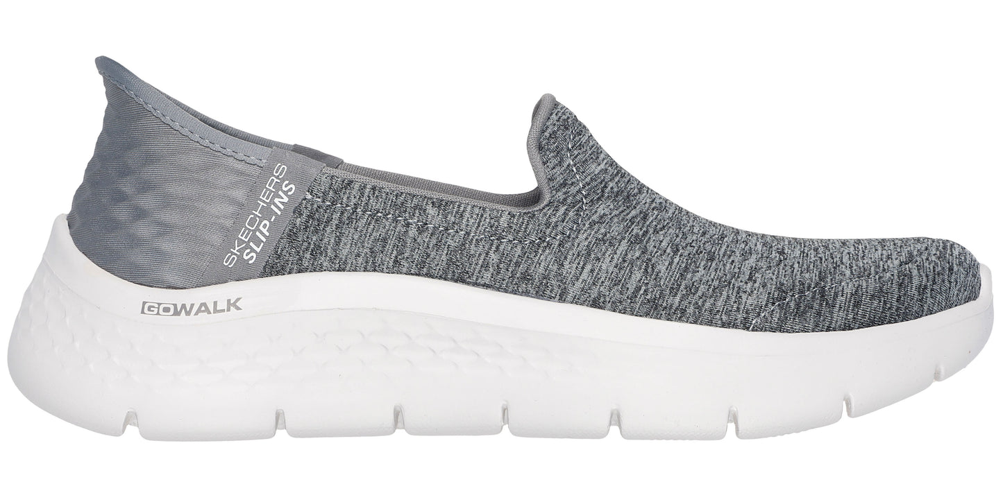 Slip-on shoe with a white platform sole and gray fabric upper.
