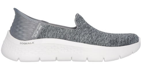 Slip-on shoe with a white platform sole and gray fabric upper.
