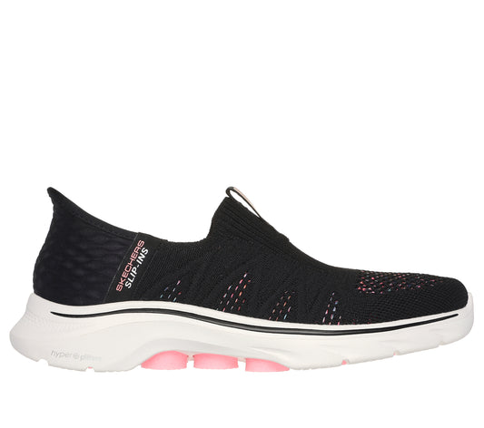 Black slip-on shoe with white sole and pink accents.