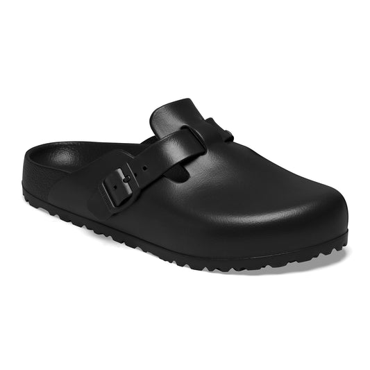 Black clog with buckle strap.