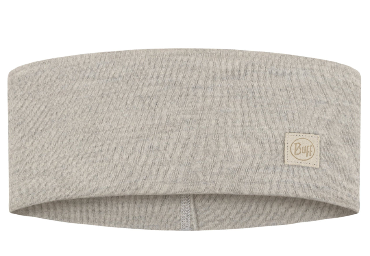 Beige fleece headband with a square tag.