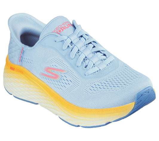 Light blue running shoe with yellow and white layered sole, pink stylized S logo, and "MAX CUSHIONING" text.