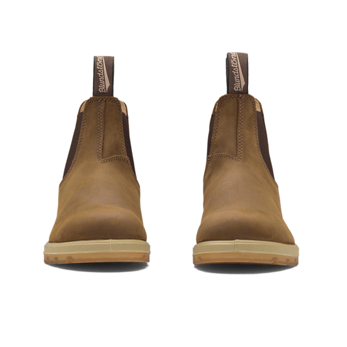 Two brown, ankle-height, slip-on boots with elastic sides, and pull tabs on the back.