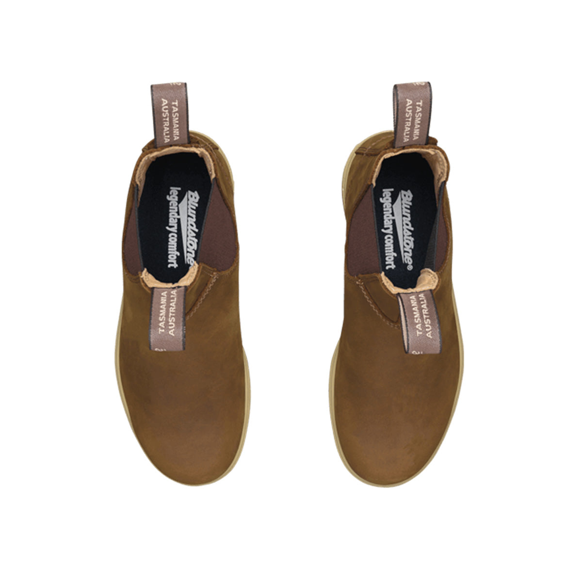 Two brown pull-on boots with elastic side panels. The lining is brown with "Blundstone legendary comfort TASMANIA AUSTRALIA" printed inside.