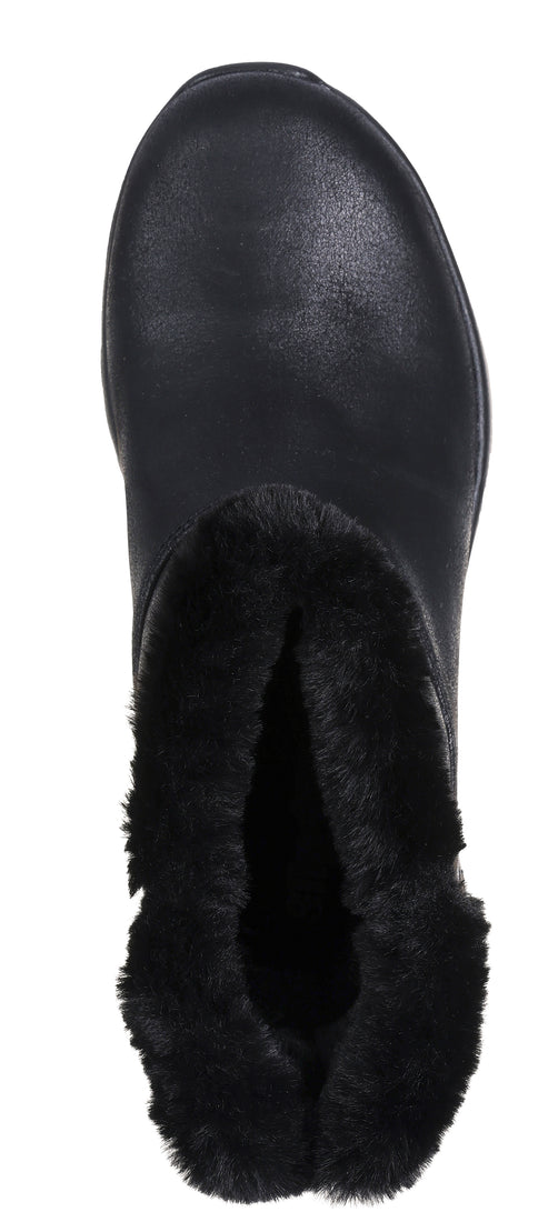 A black slipper with fur lining.