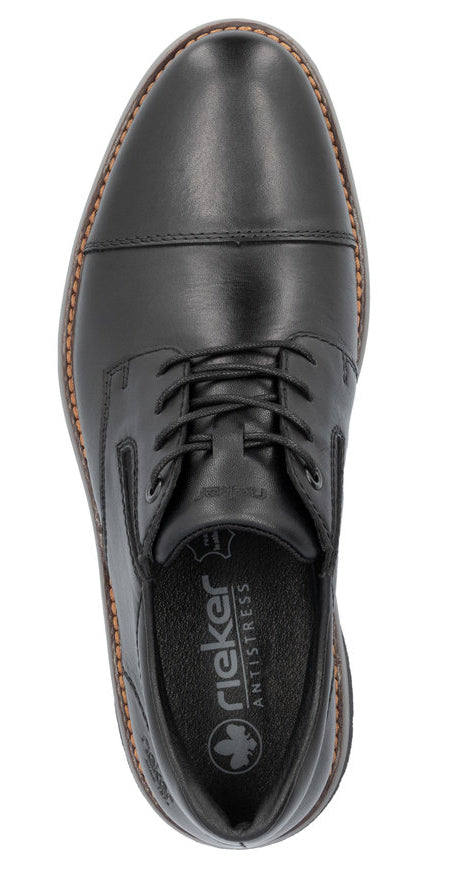 Black leather dress shoe with laces, cap toe, and visible "rieker ANTISTRESS" label inside.