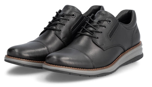 A pair of black leather dress shoes with black laces and a grey sole.