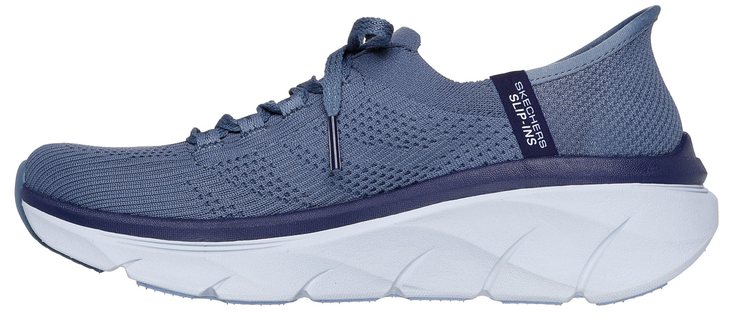 A light blue athletic shoe with white soles, laces, and visible Skechers Slip-Ins label.